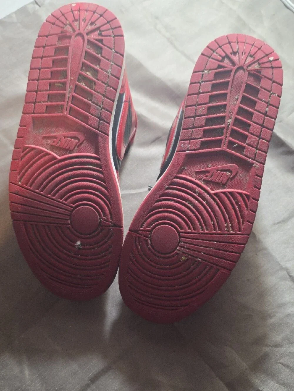 Jordan Red and Black High-Top Sneaker Tongue Label Detail